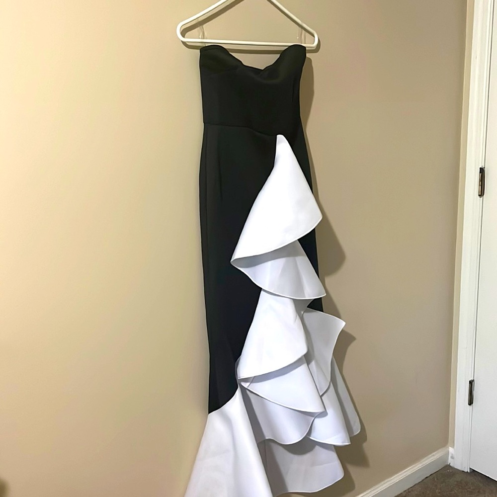 Never worn; still has the tag; Miss Ord Formal dress.